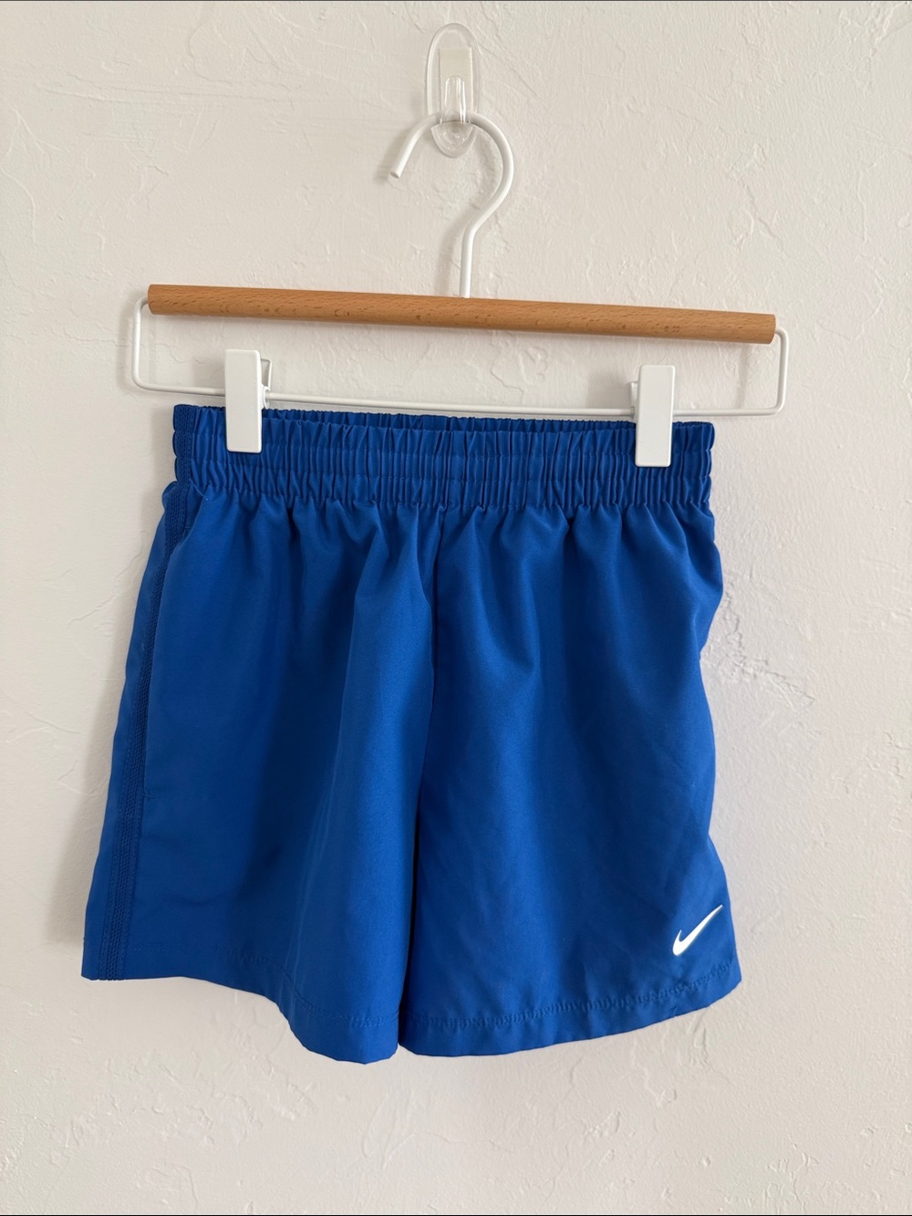 Nike Blue Athletic Shorts with White Swoosh